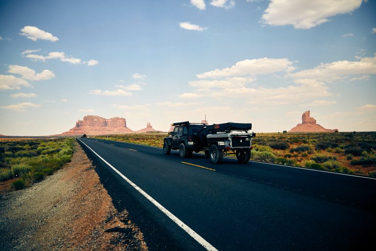 a truck driving down a road