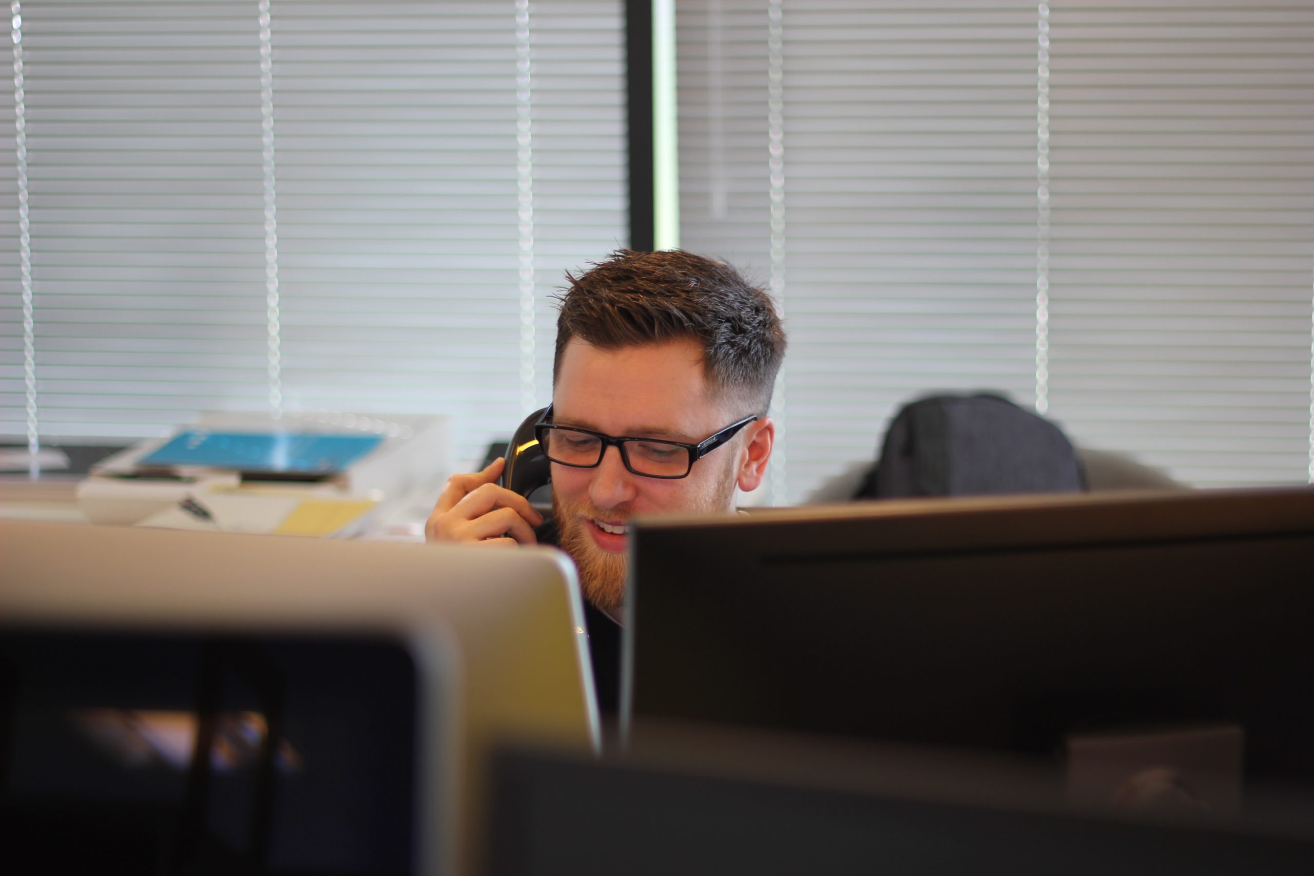 a man sitting at a desk