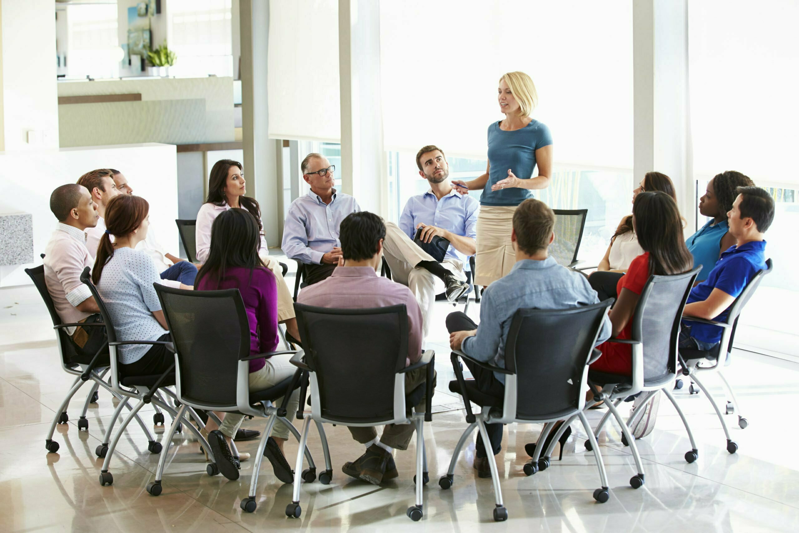 a group of people sitting in a room