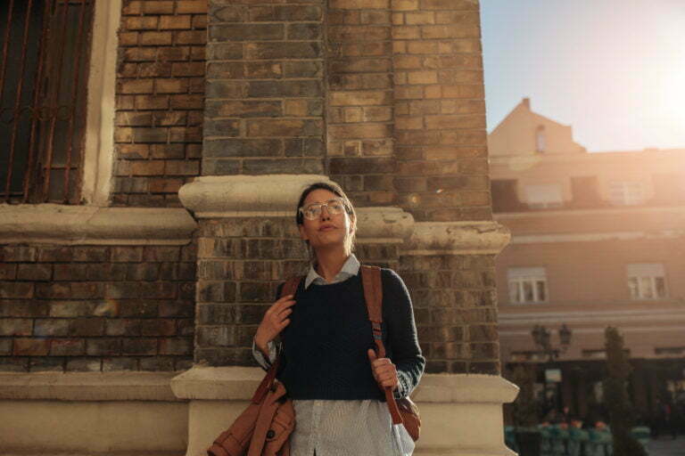 a person standing outside a building